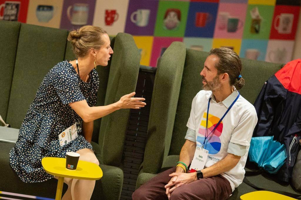 Iain chatting with Felienne near our booth.