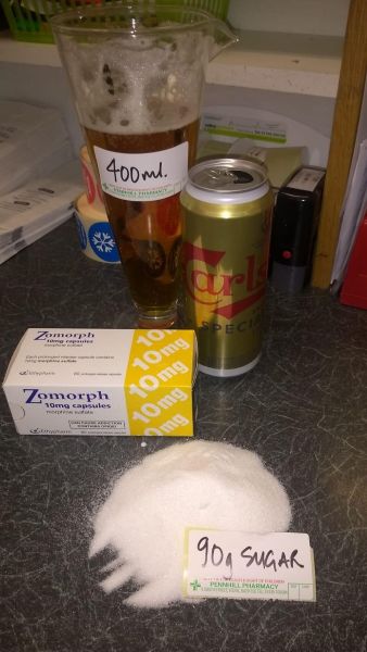 A photo visualising the morphine, sugar and alcohol content of a 300ml bottle of Oramorph®